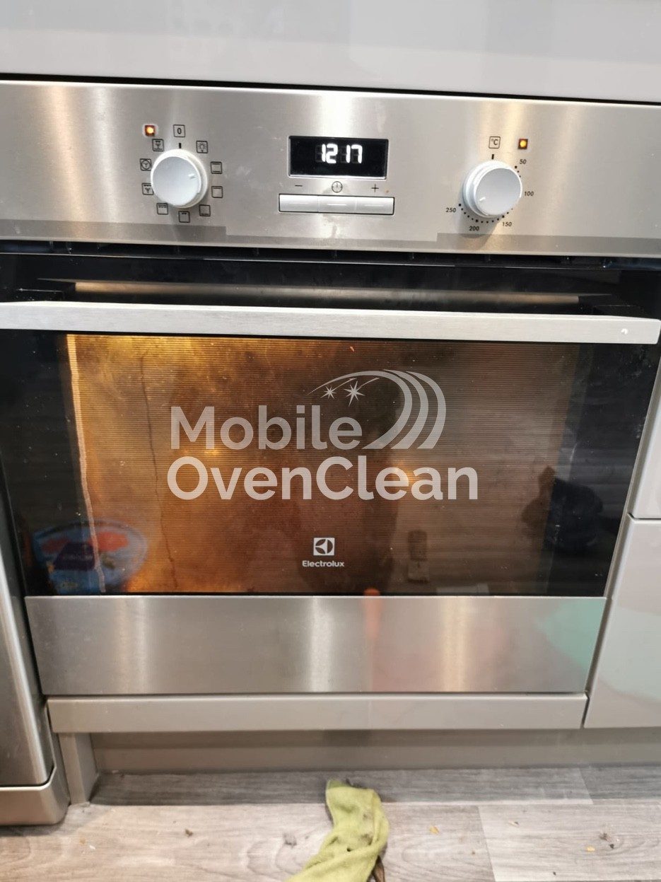 Oven before professional cleaning in Index — grease and carbon build-up